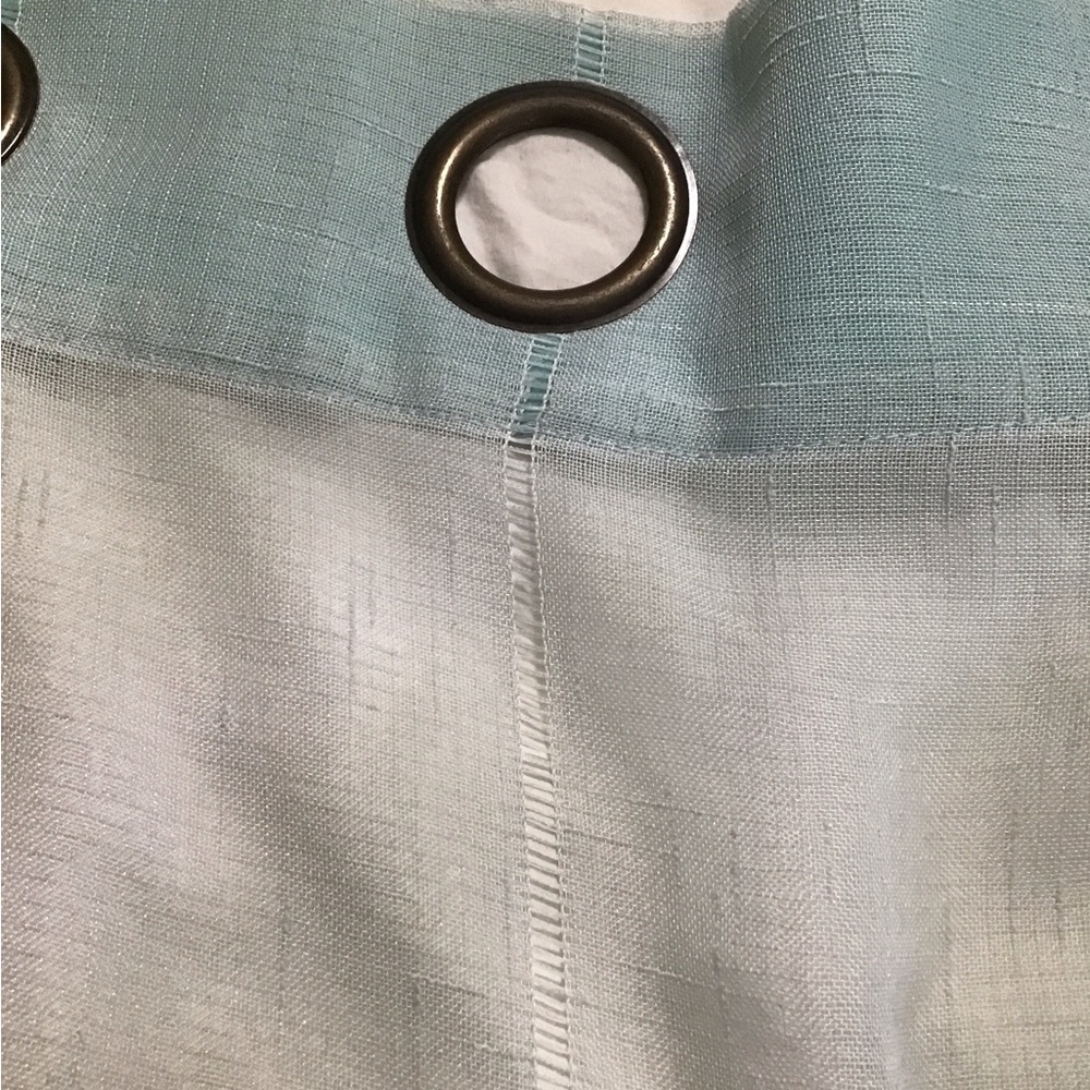 A total of 4 mint green 37 x 96 sheer Curtain panels with Bronze Grommets